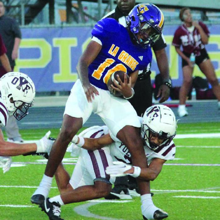 Junior Da’von Giscome ran for a team-high 186 yards for the Leps Friday. Photos by Jeff Wick