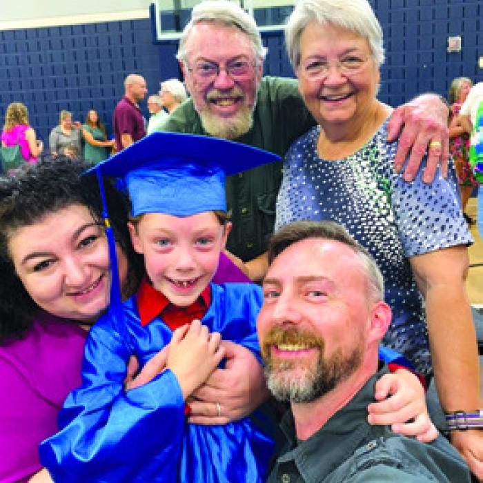 Pam and Ron Knotts, Anastasia and Derik Knotts with graduate Troy Knotts.