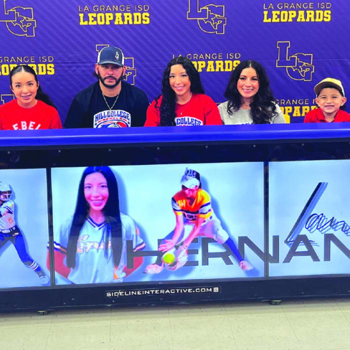 La Grange softball star Landri Hernandez signed her letter of intent to accept a scholarship to play for Hill College. She is shown at her signing ceremony Wednesday. Left to right: her sister Harli, her dad Noe Hernandez, Landri, her mom Kristi Sandoval and brother Rex. Photo by Jeff Wick