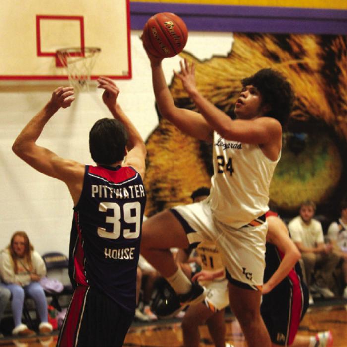 La Grange’s Devonte McKenzie drives to the basket in Wednesday’s victory over an Australian team.