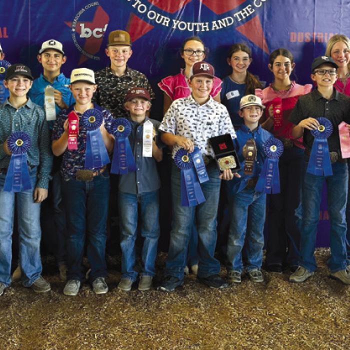 Pictured front from left: Coach JoJo Carrales, Julia Melton, Crockett Guenther, Jehnsen Janecka, Joe Carrales, Hudson Holub, Rowdy Guenther, Tate Fritsch, Kaisley Janecka, and Coach Kaci Carrales; back row: Abraham McBride, Dylan Zweschper, Holden Holub, Tatum Fritsch, Laramie Laake, Adalyn Carrales, and Hailey Janish.