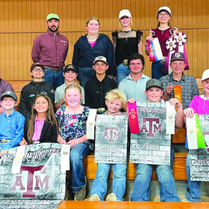 Pictured front from left: Hayleigh Pizzitola, Rowdy Guenther, Emma Zweschper, Abigale McBride, Joe Carrales, Hudson Holub, Kaisley Janecka, and Adalyn Carrales; middle row: Rilan Karisch, Tate Fritsch, Crockett Guenther, Dylan Zweschper, Logan Poncik, Holden Holub, and Abraham McBride; back row: Coach JoJo Carrales, Rheagan Karisch, Hailey Janish, and Tatum Fritsch.