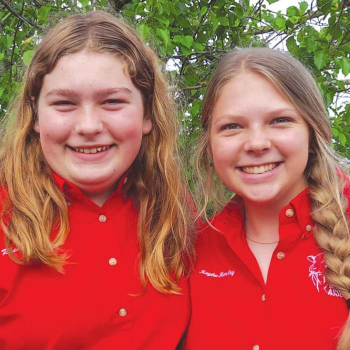 Pictured here are Rheagan Karisch and Kaylee Hensley, Junior Ambassadors for the JBBA (Junior Beefmaster Breeders Association). They attend all the major shows and assist with various duties. This trip they helped with the Easter egg hunt planned for all the showmen.