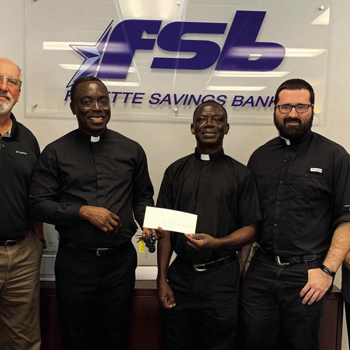 St. Rose Donates to Holy Rosary Rebuild