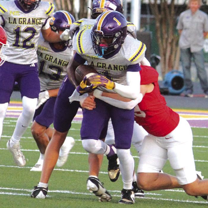 La Grange’s Trey Broussard runs back a kick-off in Friday’s game. Photo by Jeff Wick
