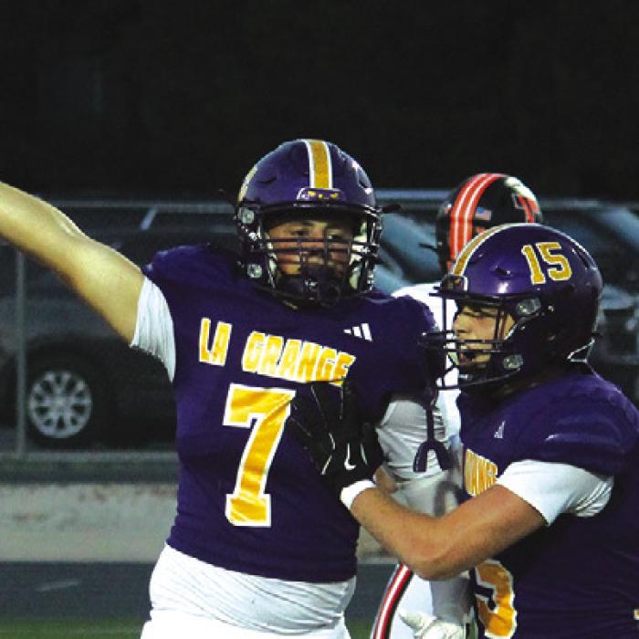 La Grange’s Christian Biles recovered two first half fumbles Friday. Here he holds one up for all to see. Photo by Jeff Wick