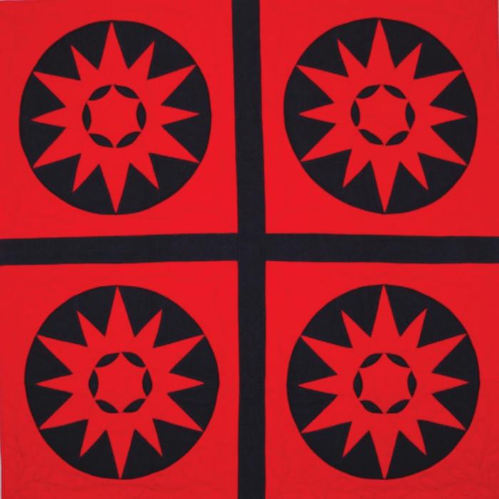 “Remnants of War” by Nancy Ostman from the new quilt exhibits opening this week in La Grange.