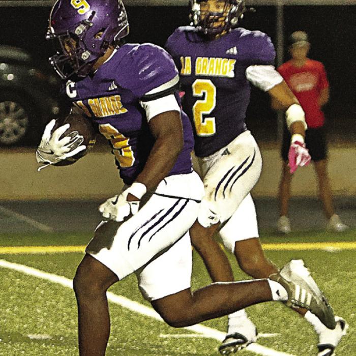 La Grange’s Klayton Michalka, left, and Dillan Johnson, right, helped power the Leps to 508 yards on the ground Friday. File photos by Darrell D. Gest