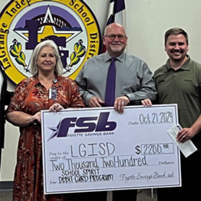 Pictured here are Fayette Savings Bank President - Wade Mozisek, La Grange ISD Superintendent – Andy McHazlett, LGISD Director of Finance – Diana Fitzpatrick, LGISD School Board President – Gary Drab, Fayette Savings Loan Officer Dillon Drab, CFO – Rodney Kalich, and Vice-President Deposit Services - Darlene Brothers. Photo by Regina Keilers