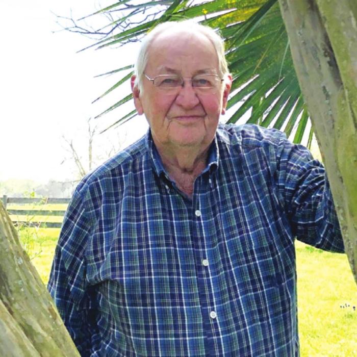 Cordell Levien of Round Top is framed by timeworn trunks of a crepe myrtle planted by his parents nearly a century ago. In the late 1930s, Cordell recalls traveling to La Grange with his father, Alfred. When Mr. Levien stopped to see his friends in the courthouse, they asked if the youngster he had by the hand was his grandson. “No,” Alfred proudly told the sheriff and the judge, “This is my youngest son, Cordell.” 