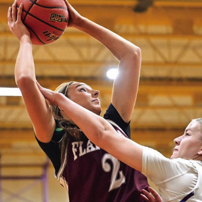 Summer Sodek puts up two points for The Flatonia Lady Bulldogs in Friday night’s win over The Weimar Lady Wildcats. Photo by Stephanie Steinhauser
