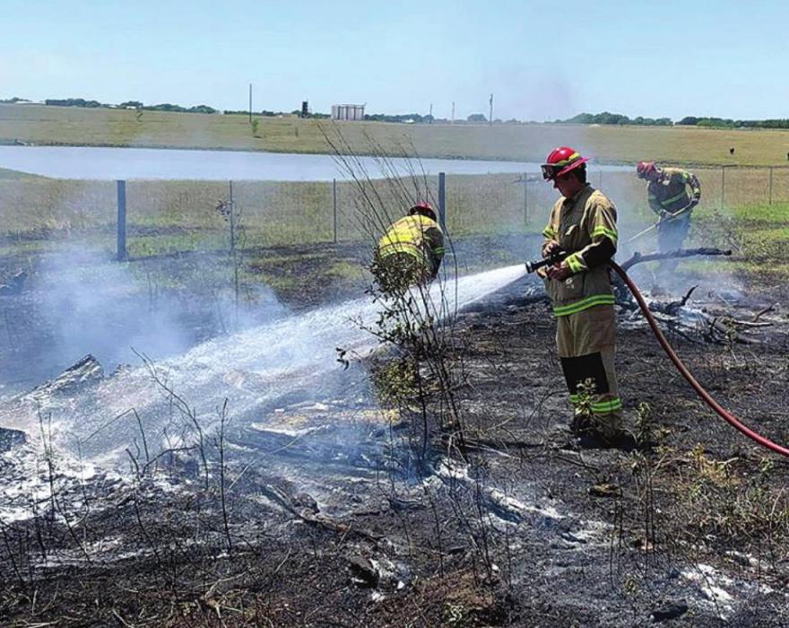 La Grange firefighters put out a small grass fire on Petter Rainosek Loop Sunday afternoon, May 10.