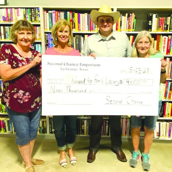 Second Chance Makes Donation to Library