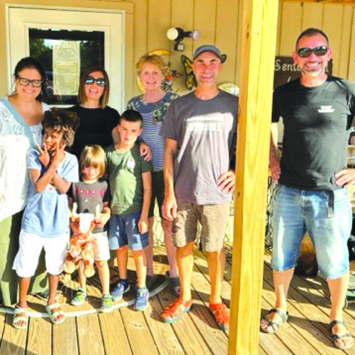 955 Antiques in Fayetteville had shoppers from Bologna, Italy on Saturday, Aug. 12. The family was traveling from Houston to Austin and stopped to shop. “What a nice, friendly family that will be going home with Texas and U.S. flags,” said owner Janice Teinert.