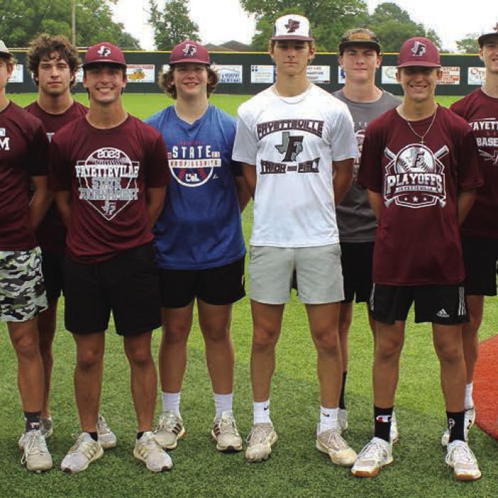 Members of the Fayetteville Lions after Wednesday morning’s practice: Coach Marcus Sodek, Jake Kubala, Lawson Fritsch, Keagan Supak, Brody Dooley, Chance Konvicka, Jack Schley, Jason Halfmann, Kole Schmitt, Easton Jaeger, Mason Fenhaus and head coach Clint Jaeger. Not all players present. Photo by Jeff Wick