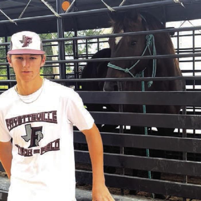 Jack Schley’s horse was waiting for him outside baseball practice Wednesday. From practice the two headed out to work cattle. Photo by Jeff Wick