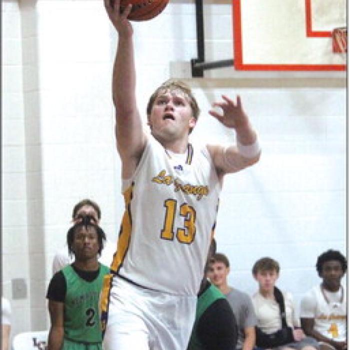 La Grange’s Conner Brooks scored a team-high 22 points Monday in the Leps’ first game of the season. Photo by Jeff Wick