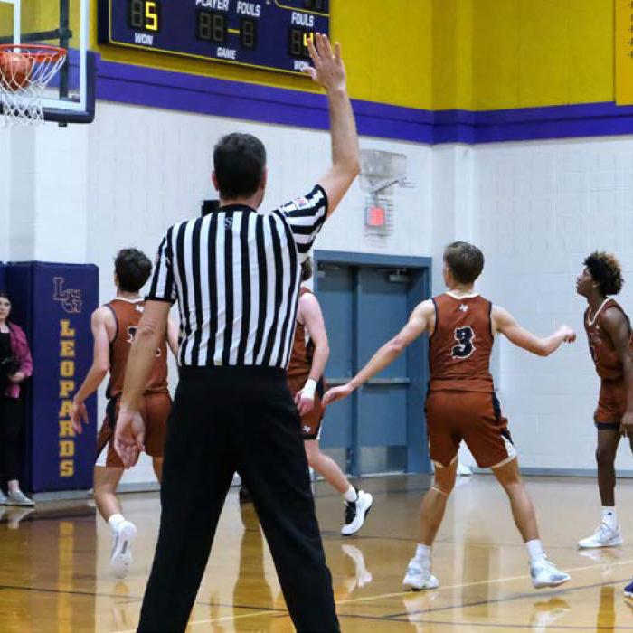 Nygren’s Late Free-Throws Clinch One Point District Hoops Win for Leps