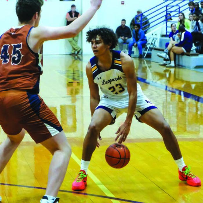 Nygren’s Late Free-Throws Clinch One Point District Hoops Win for Leps