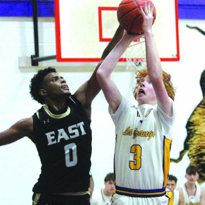 La Grange’s Hunter Gross takes a shot Friday against the defense of Victoria’s Braedyn Cates. Photo by Jeff Wick