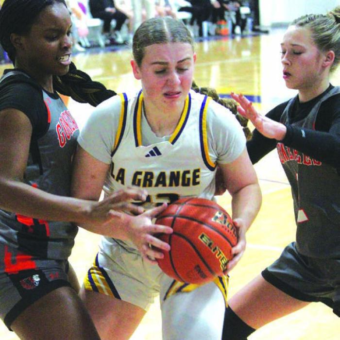The La Grange girls basketball team defeated Gonzales Friday at home 47-39 as the Lady Leps improved their overall record to 14-5 this season. Shown above, in action in Friday’s win are, left to right, La Grange’s Macie Collier, Campbell Cooper and Hannah Gross. The Leps Leps are off until they play in the Aggieland Invitational Dec. 29-31. Photos by Jeff Wick