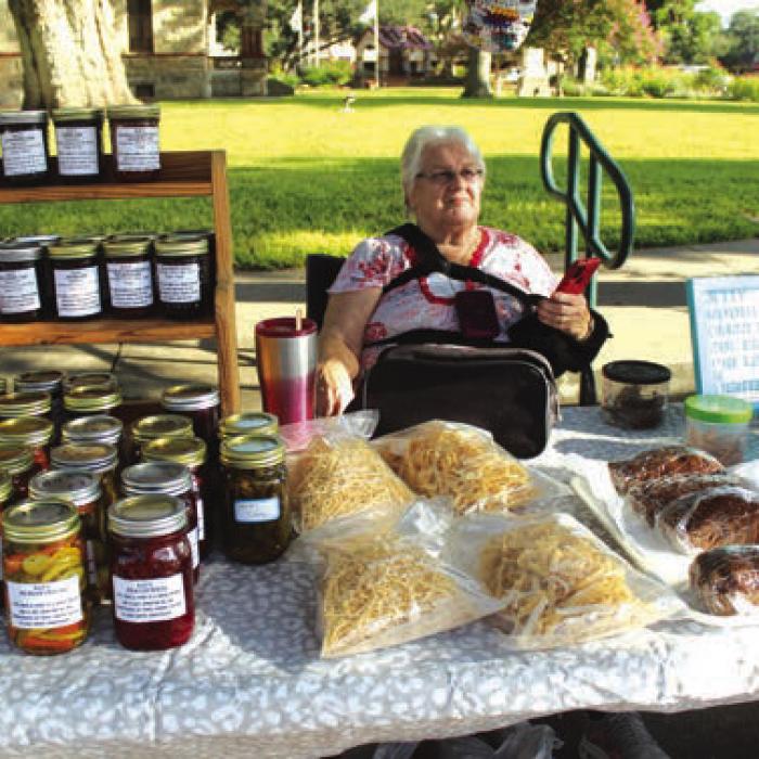 Kathleen Albrecht of Giddings was selling jelly, noodles, zucchini bread and crochet work.