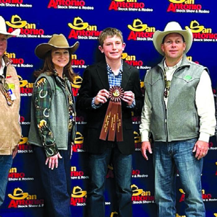 SALE Intermediate Individual: Kaden Raabe pictured with SALE Representatives.