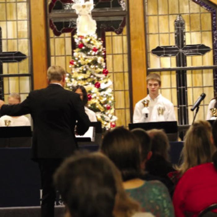 Handbells from left: Rayli Woelfel, Miriam Meyer, Ruth Meyer, Hudson Stueber, Kaylee Wolff, Elijah Kueck and Director Mr. Schaefer.
