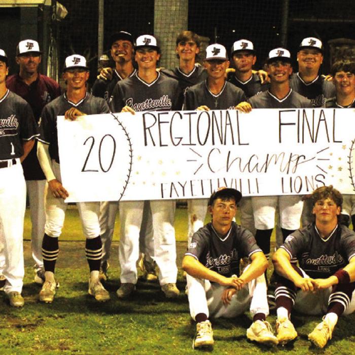 The members of the Fayetteville Lions pose after sweeping Round Top-Carmine in their regional final series Thursday in Brenham. Photos by Jeff Wick
