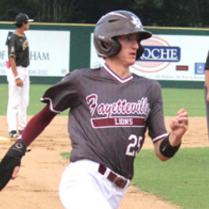 Fayetteville’s Easton Jaeger rounds third, heads for home.