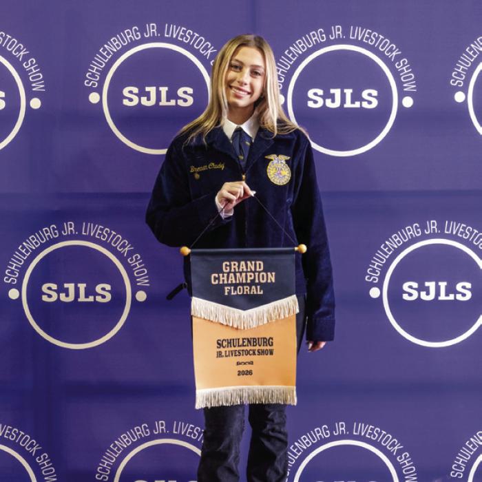 Brennan Chudej won grand champion in the floral cup division. Lilly Wotipka (not pictured) won reserve champion.