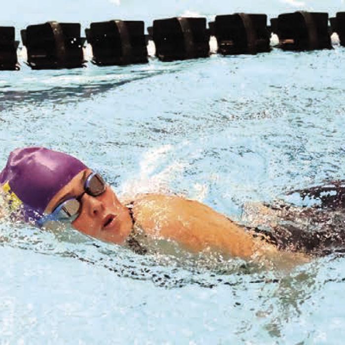 Laney Herdler broke her 500-yard freestyle record for the second time this season. She shaved an impressive 2.95 seconds off her previous time, establishing a new school record of 7:15.24. Photo by Katy Michalke