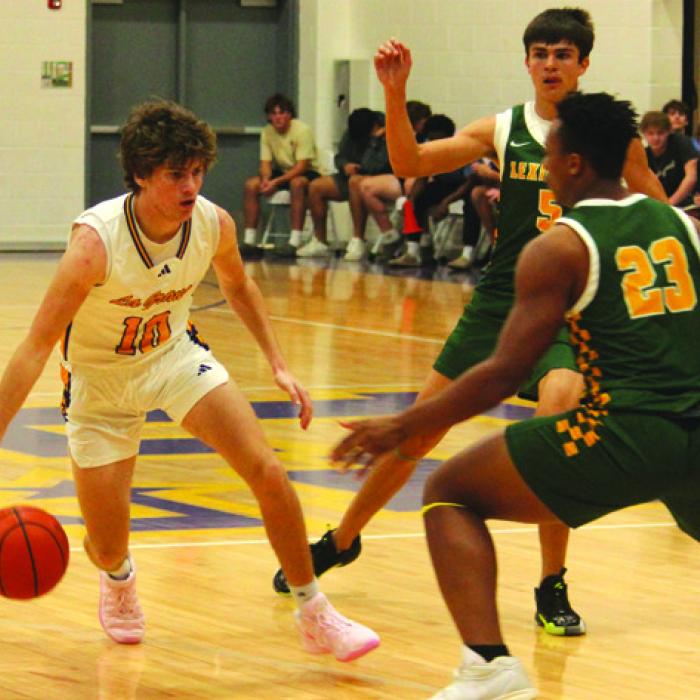 Photos by Jeff Wick Cole Collier looks for an opening against the Lexington defense Tuesday.