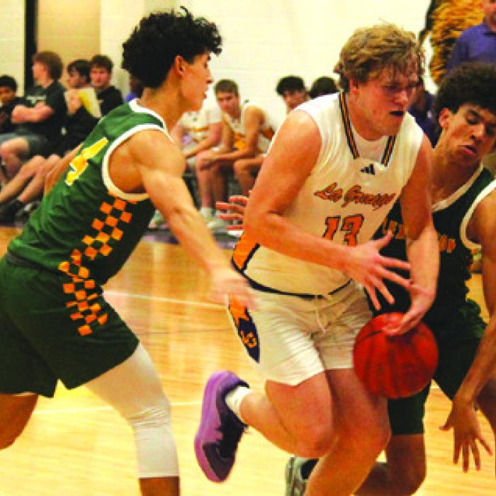 Conner Brooks drives to the basket Tuesday.