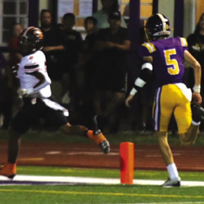Schulenburg’s Byron Johnson looks back as he scores a touchdown Friday. Photo by Audrey Kristynik