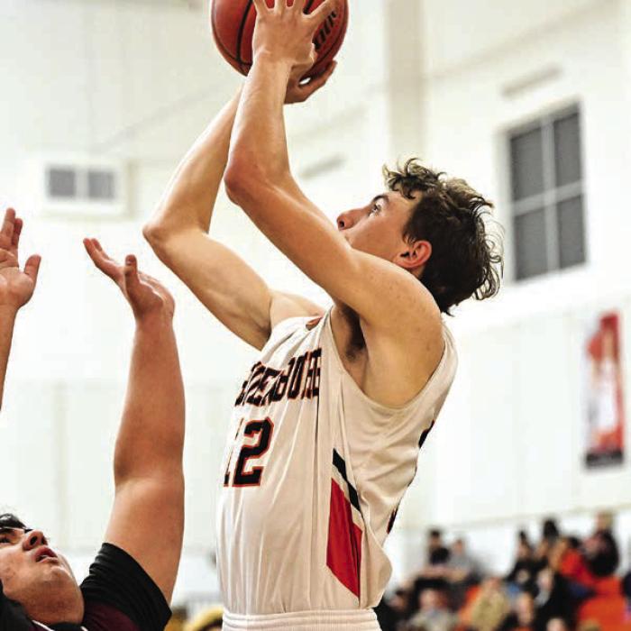 Schulenburg senior Van Prihoda goes up for two in Tuesday’s win over Flatonia. Photo by Stephanie Steinhauser