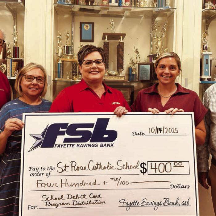 On hand as Fayette Savings Bank presented a check to St. Rose School (SRS) through its School Spirit Debit Card Program were (from left): Mike Olle, FSB; Michele Kubos, SRS Bookkeeper; Cheryl Brossmann, FSB; Taylor Jensen, SRS Principal; Gary Zweschper, SRS Advisory Council President.