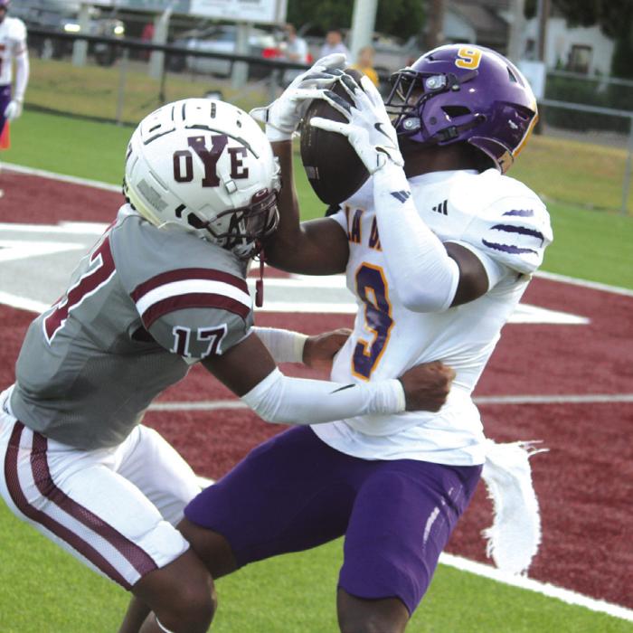 La Grange’s Dillan Johnson, right, would haul in this pass and turn it into a touchdown Friday. Photo by Jeff Wick