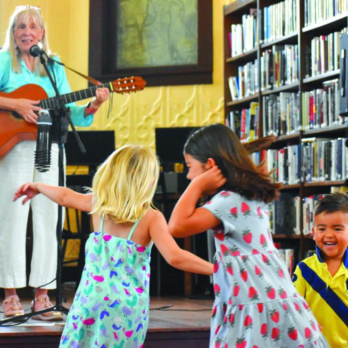 Big smiles and lots of fun during Sue Young’s performance at the Round Top Family Library last summer.