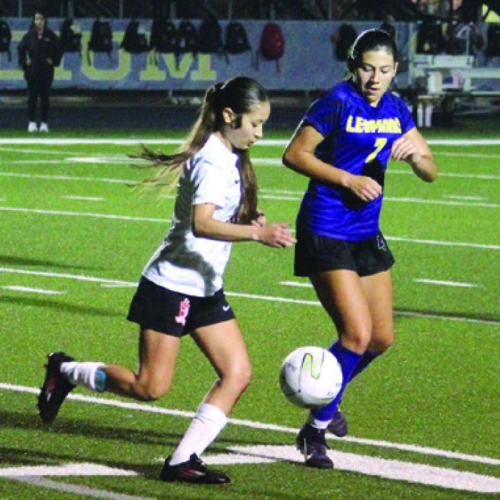 Lady Lep Melanie Cruz tries to stop an advance by this Palacios player in Friday’s match