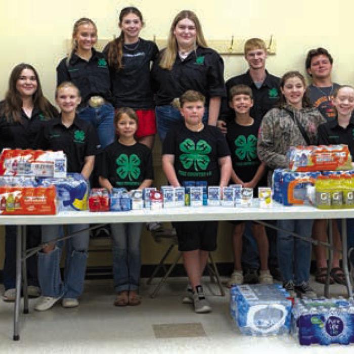 Brandon Karisch was on hand representing the Ellinger Volunteer Fire Department to accept a donation of water, Gatorade and other electrolyte drinks from the Pure Country 4H Club. The club donated these items at the recent meeting on Sunday, May 17.