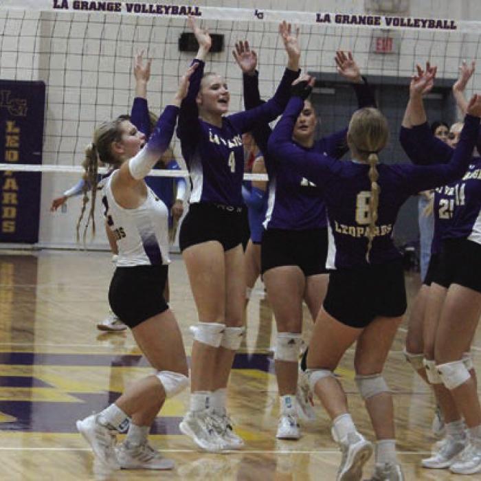 The members of the La Grange volleyball team celebrate a point during Tuesday’s victory over Navasota. Photo by Jeff Wick