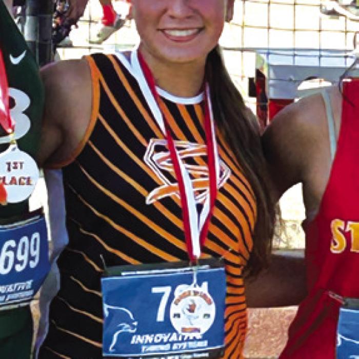 Schulenburg’s Ellie Hammack on medal stand in El Campo.