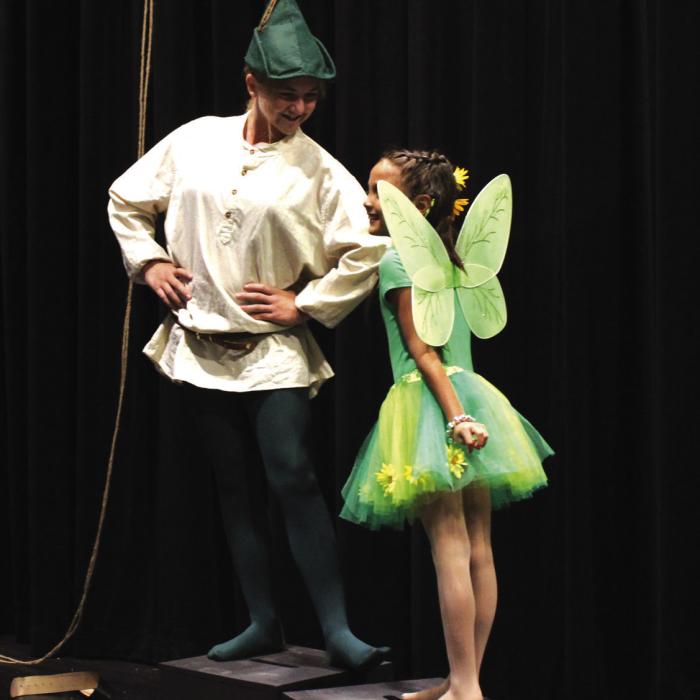 Peter Pan, Layelah Martin, and Tinker Bell, Bella Hernandez, joke around during a photo shoot this week. Photos by MaKenzie Givan