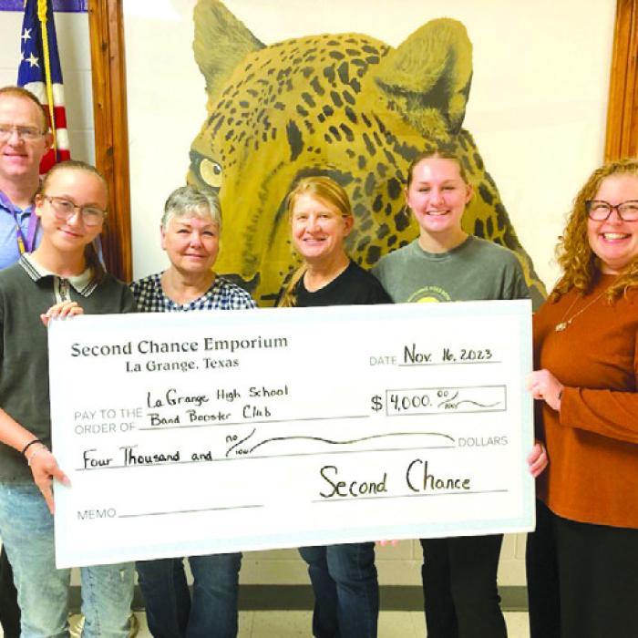 Second Chance Donates to Band Booster Club, RT Family Library