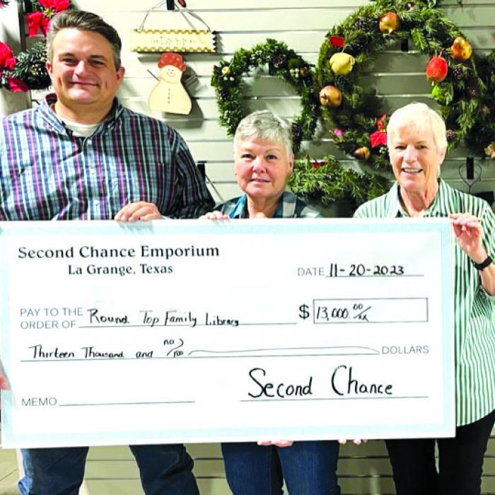 Second Chance Donates to Band Booster Club, RT Family Library