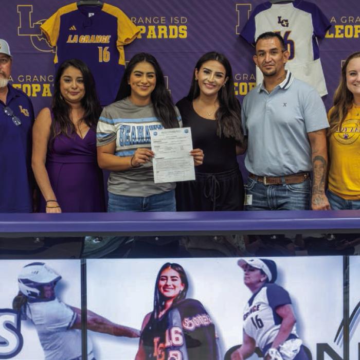 La Grange pitcher Marissa Gonzales signed a letter of intent to play softball at Lamar State College in Port Arthur. La Grange High School hosted a signing ceremony for her on Monday, May 20. Pictured above are La Grange Softball Coach Robert Young, mother Annabelle Gonzales, Marissa Gonzales, sister Melissa Gonzales, father Frank Gonzales and La Grange Assistant Softball Coach Hannah Gerecke. Photo by Andy Behlen