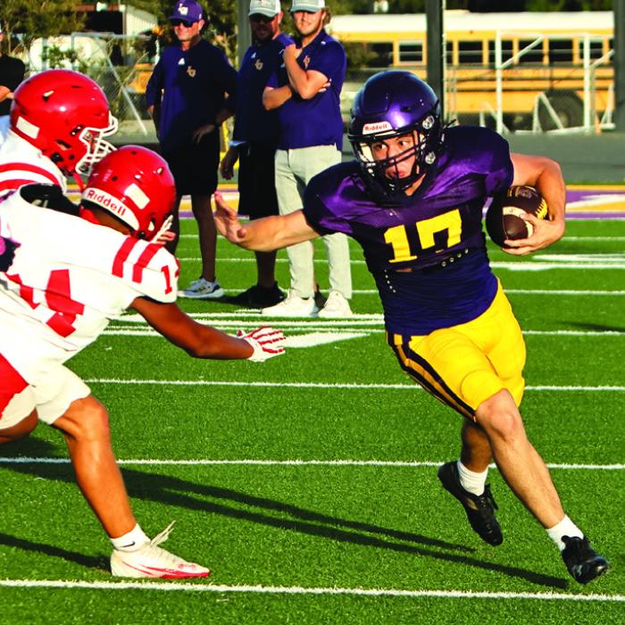 La Grange’s Jeffrey Cabrera runs the football in last Friday’s scrimmage against El Campo. Photo by Darrell D. Gest