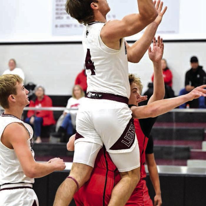 The Fayetteville boys basketball team improved its record to 15-5 as they won a pair of games last week, beating Burton 72-57 and Dime Box 85-43. That win over Dime Box was the team’s district opener. The Lions have now won six games in a row and host North Zulch Tuesday at 6:30 p.m. Above is Kole Schmitt, left, and Jack Schley, right, in action in last Tuesday’s victory over Burton. Photos by Stephanie Steinhauser
