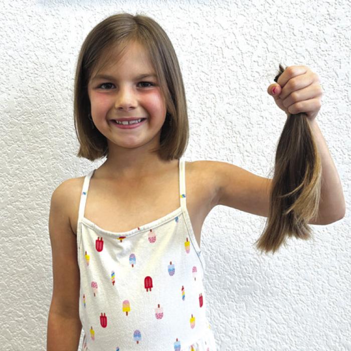 Bailey Tousek Donates Hair